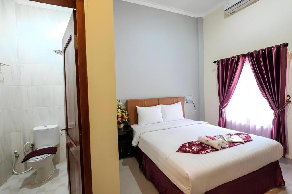 Malioboro Garden Hotel Джокьякарта Экстерьер фото